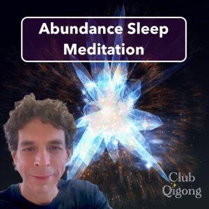 Joe with crystals behind him and the words, Abundance Sleep Meditation